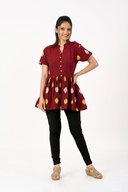 Maroon peplum top HANDLOOM
